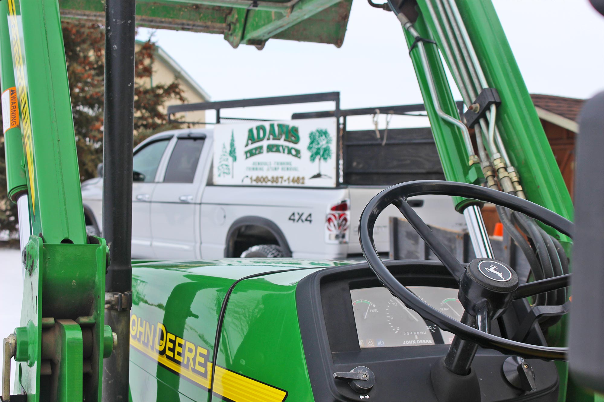 Adams Tree Service tractor and truck